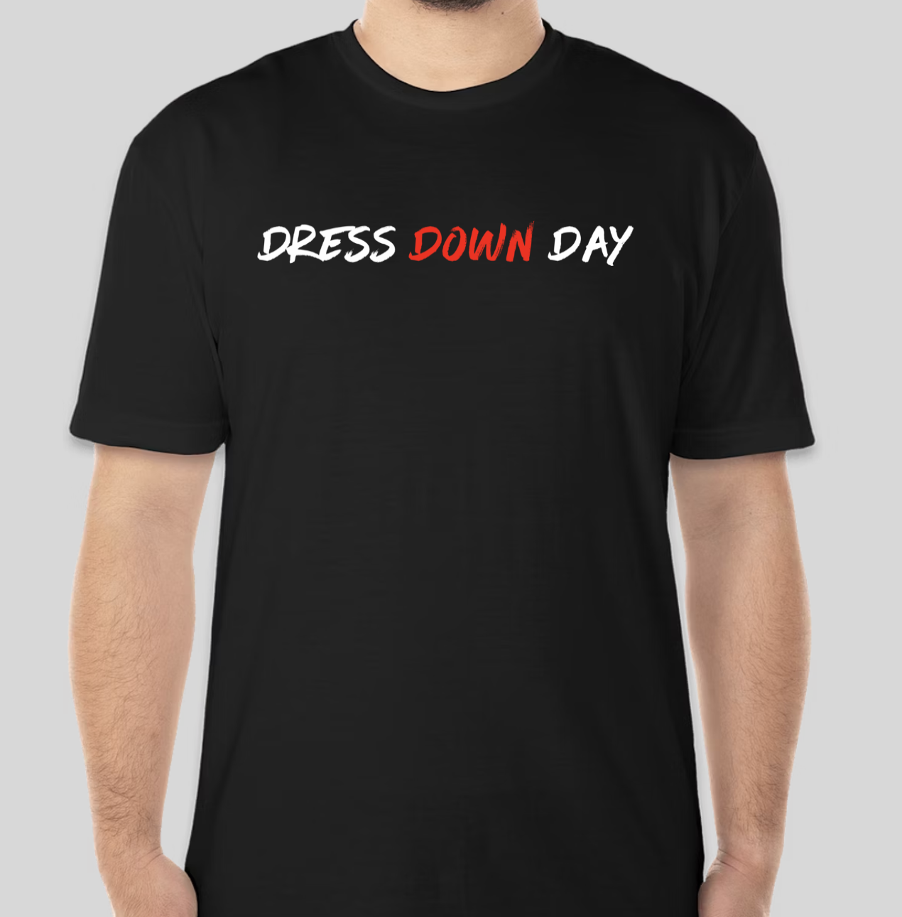 The Dress Down Day t-shirt features the phrase dress down day on the front. The phrase is derivative of a style of dress that is simple or casual in nature. The traditional BHS logo has been applied to the back of the t-shirt.