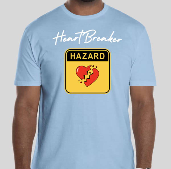 The Heart Breaker t-shirt features the phrase heart breaker written in cursive script. Underneath the script is a hazard symbol with the BHS heart in the middle of the hazard sign. The slim BHS logo has been applied to the back of the t-shirt.