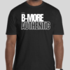 The B-More Authentic t-shirt features boxed text which spells out an abbreviated version of the word Baltimore. An altered version of the BHS logo is applied to the back of the t-shirt.