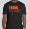 The B-More Authentic t-shirt features boxed text which spells out an abbreviated version of the word Baltimore. An altered version of the BHS logo is applied to the back of the t-shirt.