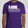 The B-More Authentic t-shirt features boxed text which spells out an abbreviated version of the word Baltimore. An altered version of the BHS logo is applied to the back of the t-shirt.