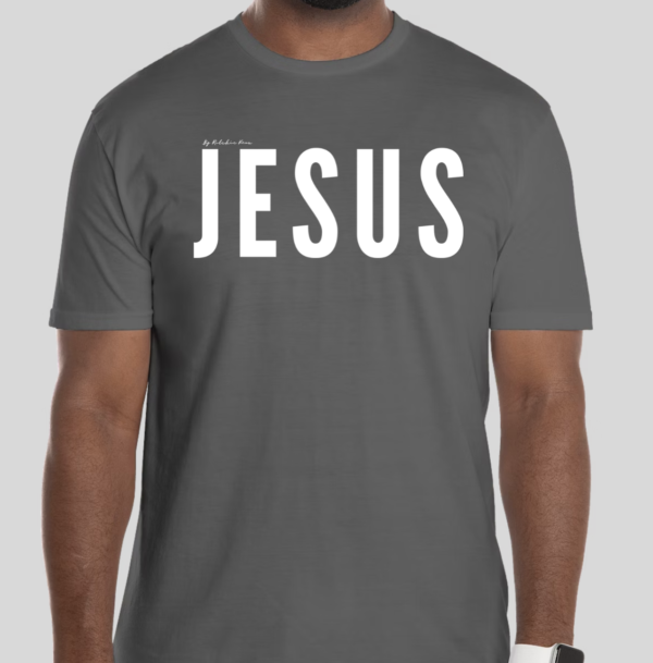 Charcoal t-shirt with the word 'Jesus' in bold white letters on the front; back features Broken Heart Shirts logo with a 'B', broken heart icon, and 'S'.