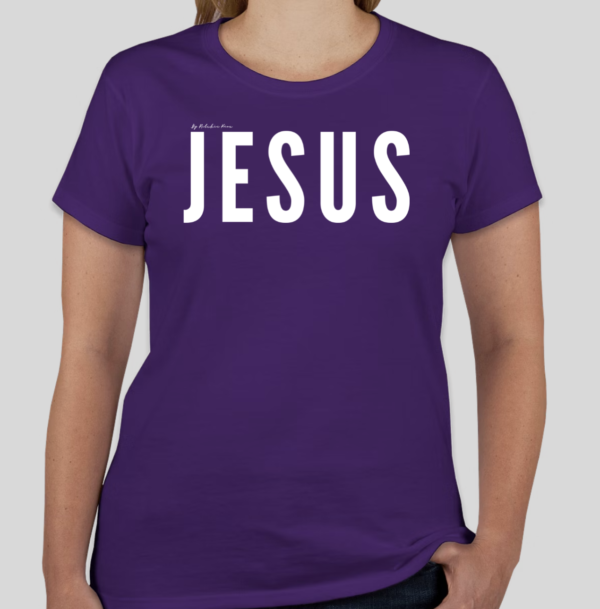 Purple t-shirt with the word 'Jesus' in bold white letters on the front; back features Broken Heart Shirts logo with a 'B', broken heart icon, and 'S'.